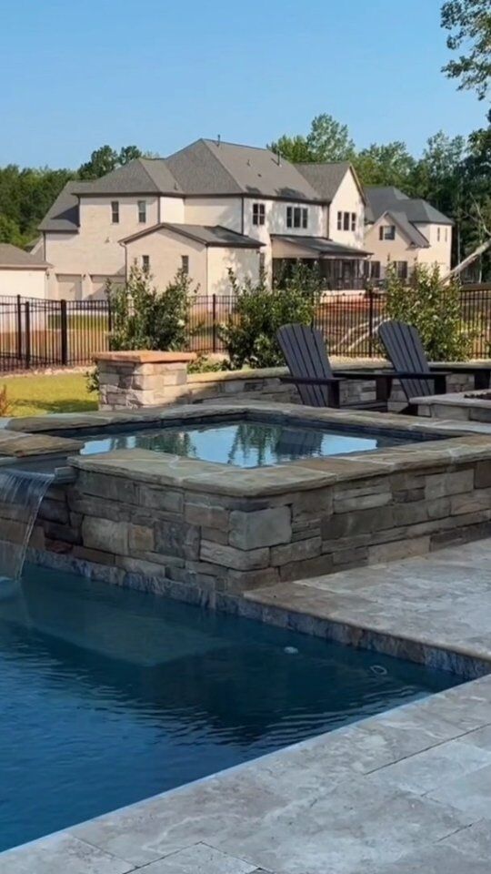 We had so much fun with this project in the Oldenburg neighborhood! 🎉 Collaborating closely with the homeowners, our team at The Stoneman crafted a stunning outdoor oasis tailored to our client's vision.

From the distinct pool design, featuring sleek wooden panels for added privacy, to the meticulous selection of materials such as natural stone crab orchard caps and walnut travertine pool coping and decking, every detail was thoughtfully considered to harmonize with their unique style and home aesthetic. 

Cheers to another successful partnership! 🌟

•
•
•

#stonemanrocks #tavertinetile #geometricstone #warmweather #backyarddream